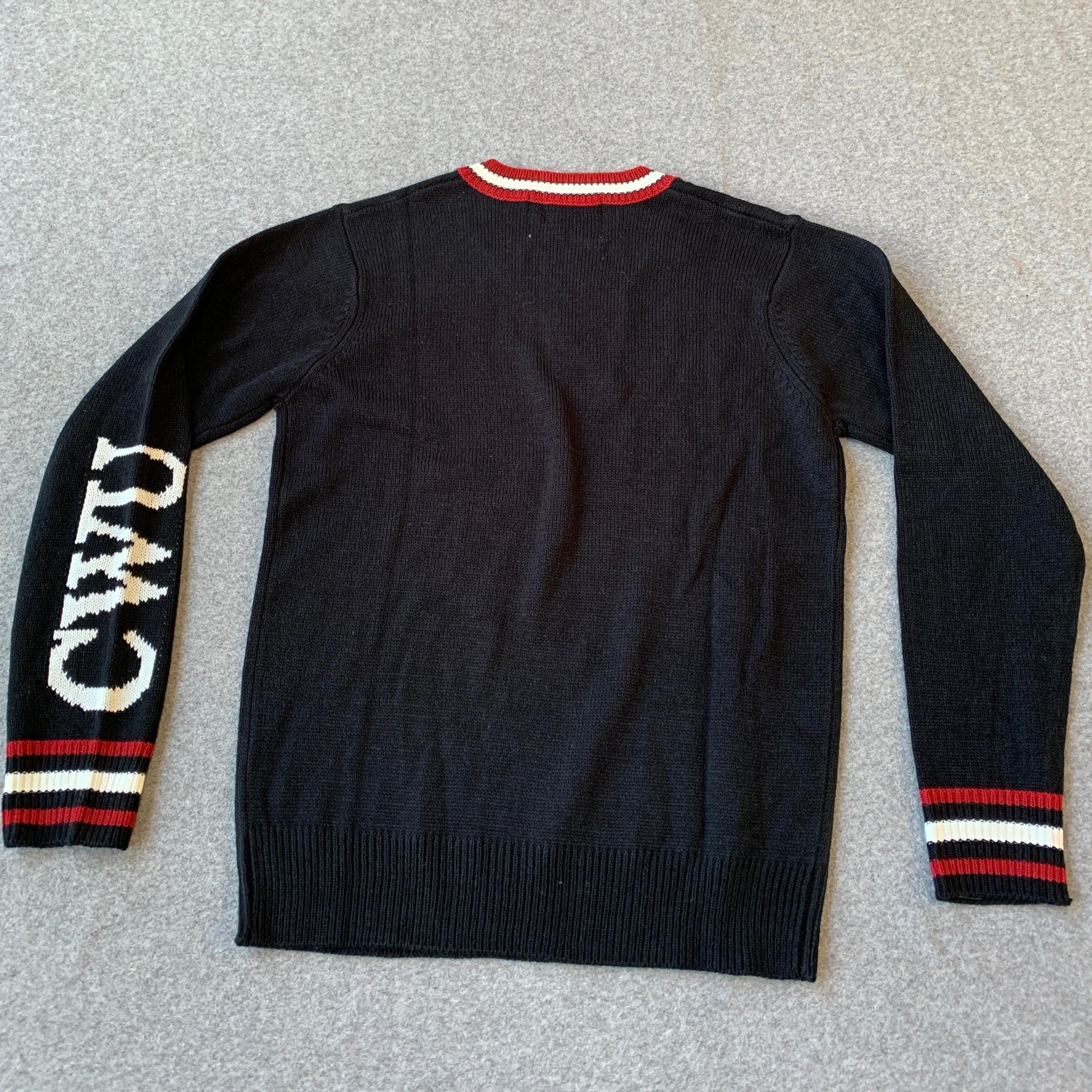 CENTRAL WASHINGTON BLACK TRIBUTE V-NECK SWEATER (UNISEX SIZING)