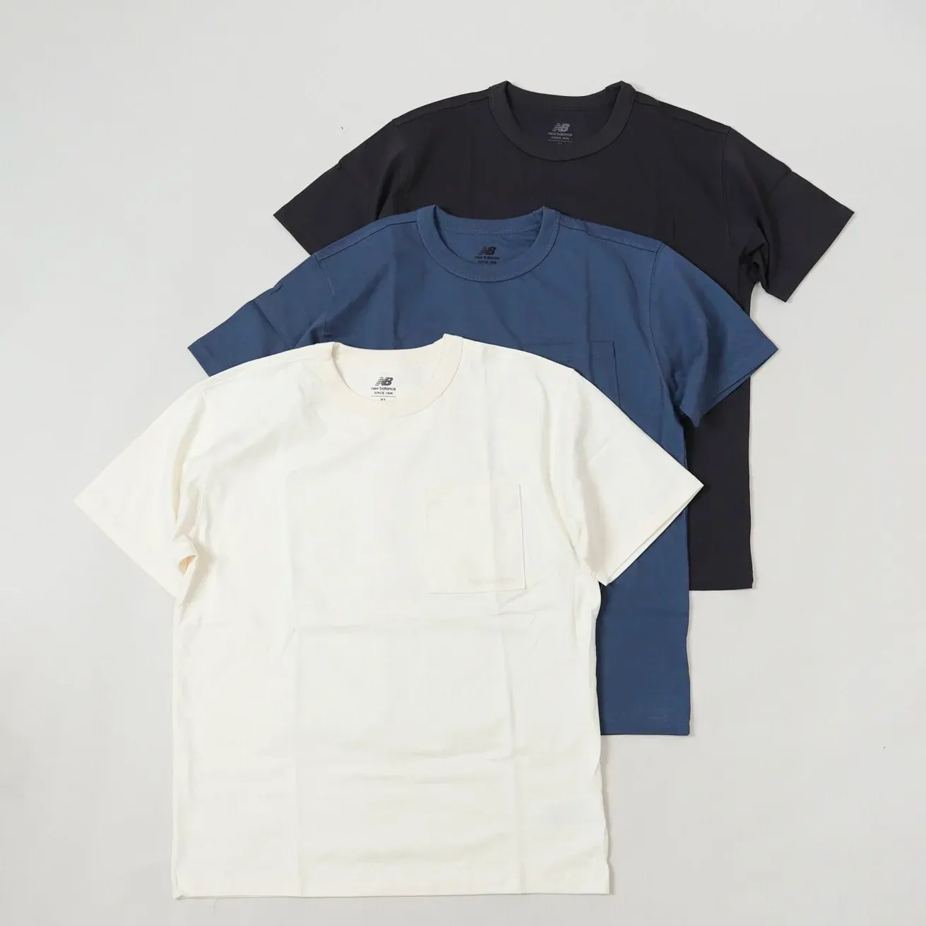 New Balance Pocket Tee [AMT23567]