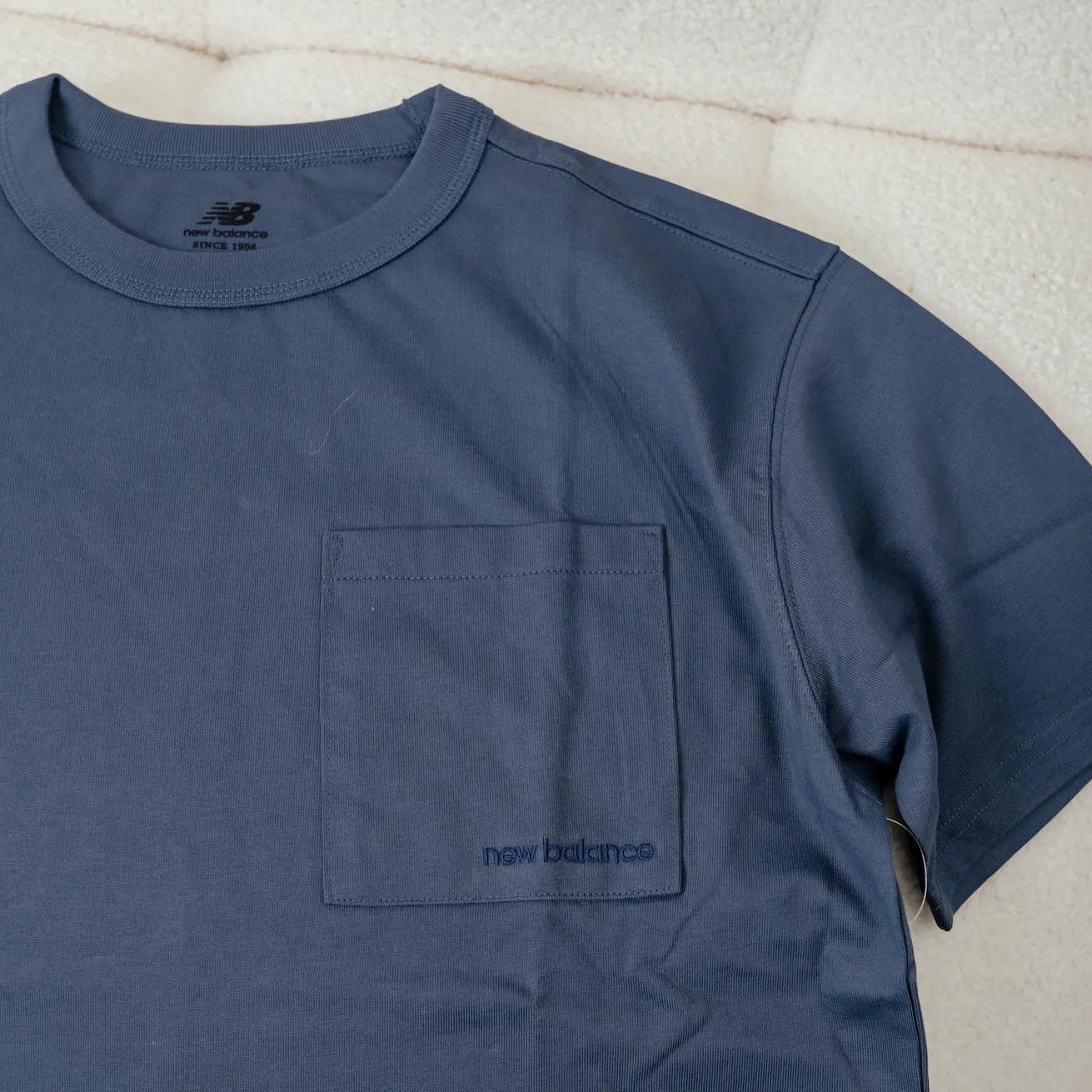 New Balance Pocket Tee [AMT23567]